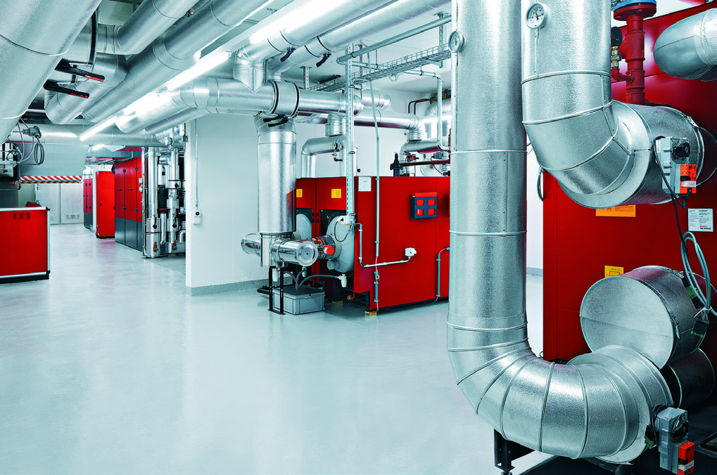 Heizzentrale mit Blockheizkraftwerk Heizzentrale mit Blockheizkraftwerk